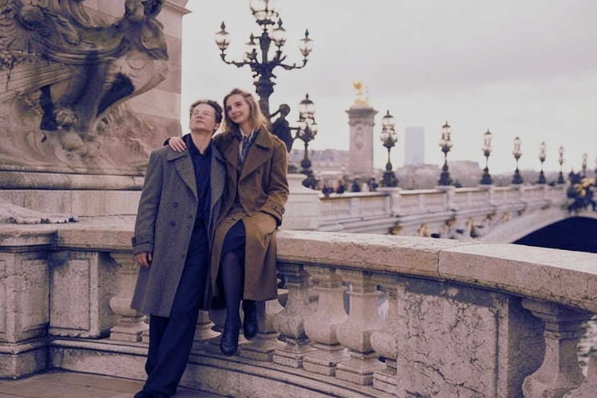 Paris couple winter evening bridge