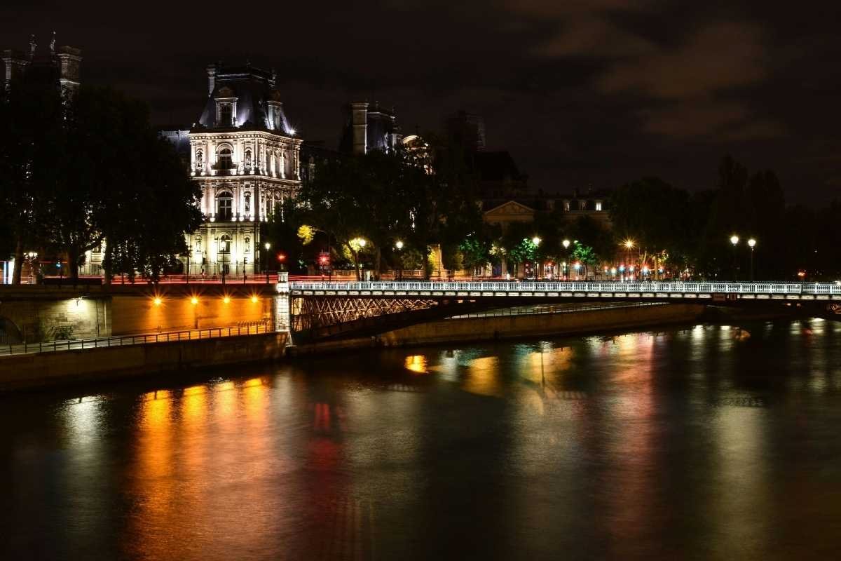 Paris winter budget 2026 Seine river at dusk with lights reflecting on water