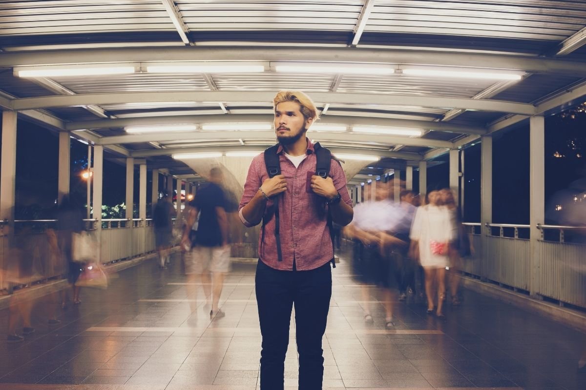 Is Paris safe at night in 2026: traveler walking near a Metro station entrance at night, showing how navigation mistakes and fatigue create anxiety more than real danger