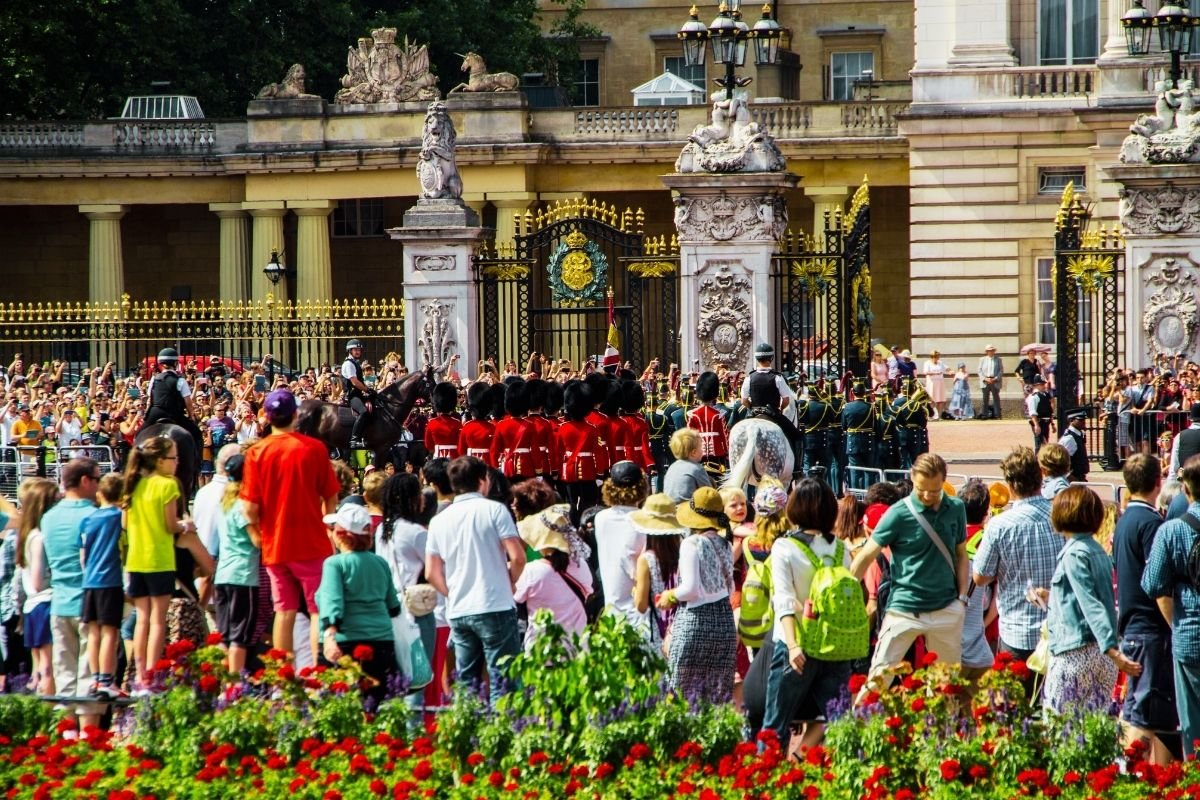 Traveler entering a landmark with timed-entry—afternoon anchors prevent queues from breaking a one-day London plan.
