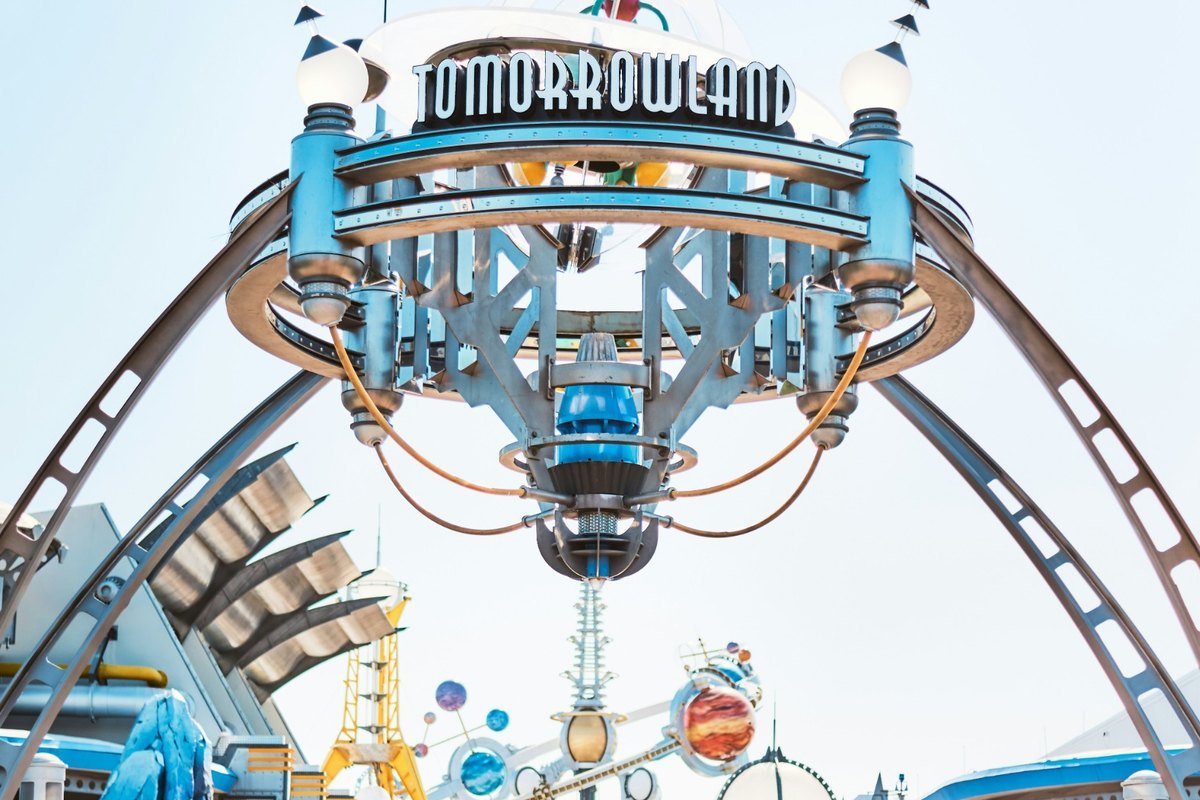 Families and couples exploring Tomorrowland in Magic Kingdom
