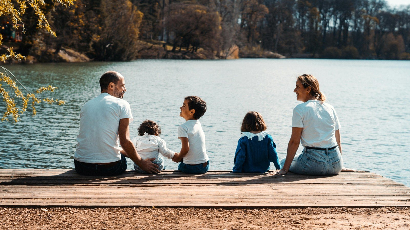 Family enjoying a calm and relaxing vacation experience by the water