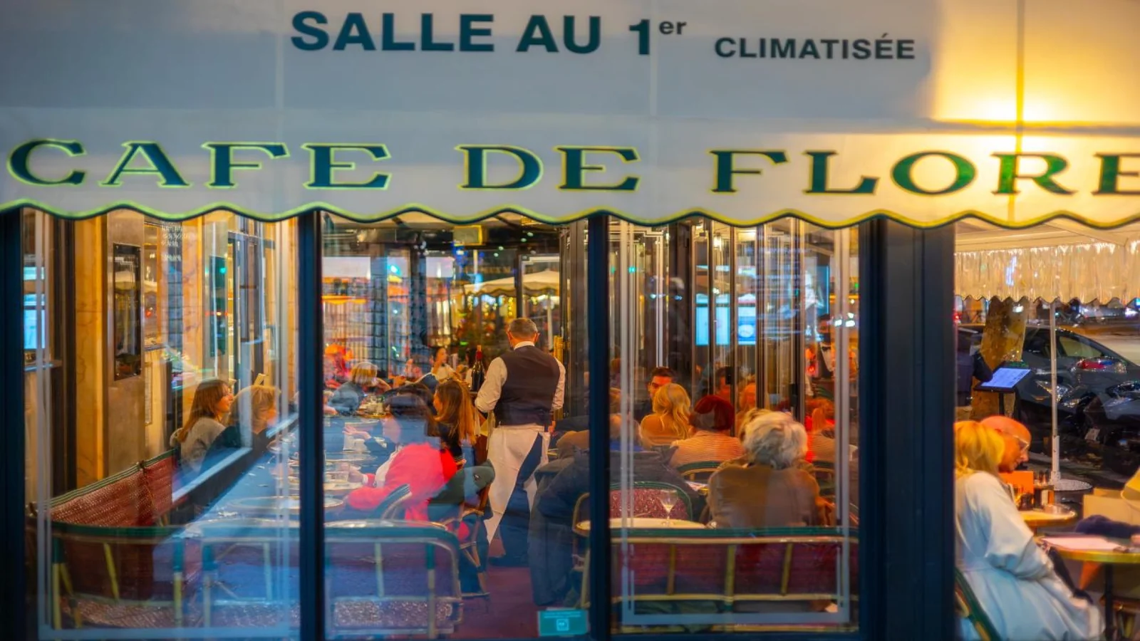 Dining inside Café de Flore, one of the most iconic restaurants and cafés in Paris, France