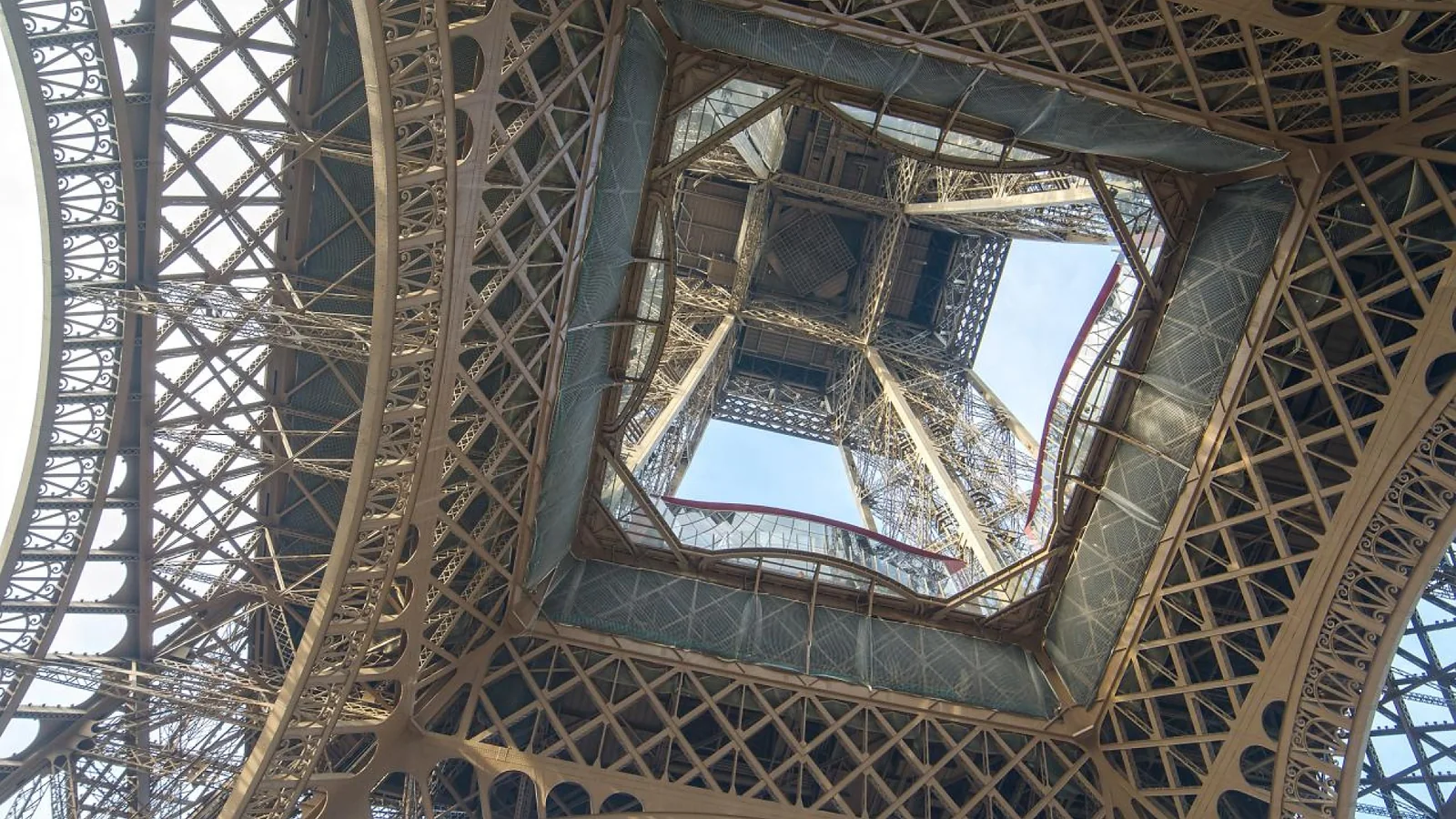 Looking up through the iron structure toward the upper levels