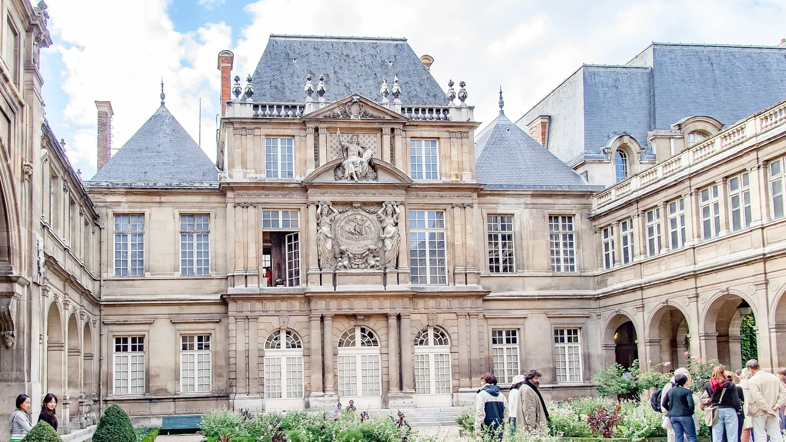 Historic courtyard and garden inside Musée Carnavalet in Paris
